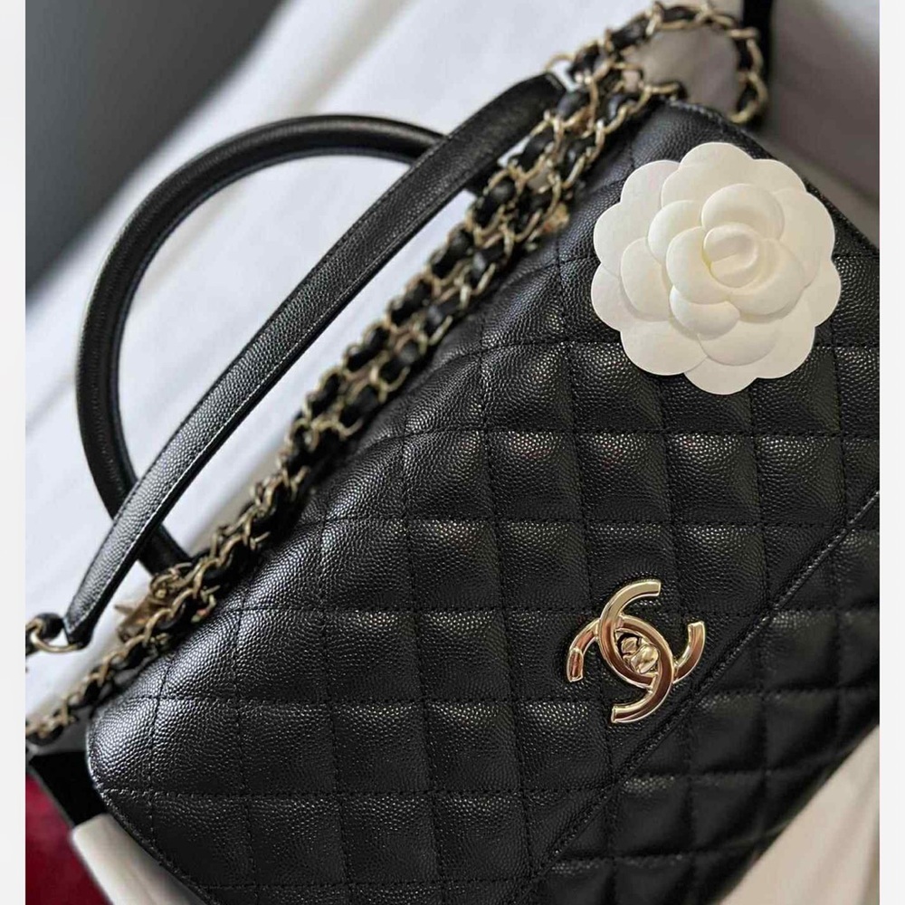 Chanel Chic Black Quilted Handbag with Chain Strap